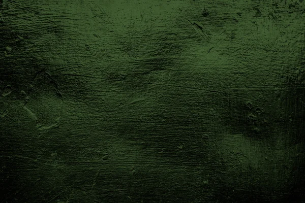 Verde escuro velha textura de metal riscado com bordas sombreadas — Fotografia de Stock