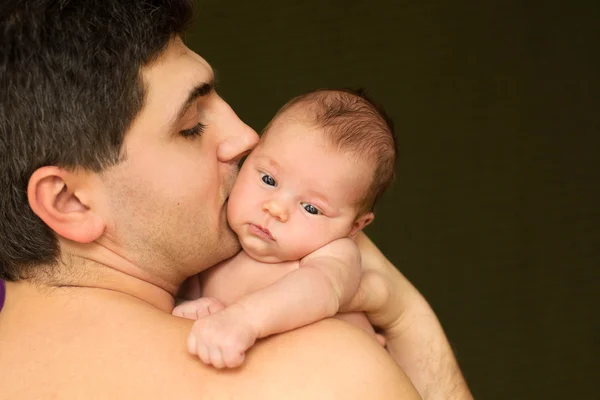 Baby on the fathers hands — Stock Photo, Image