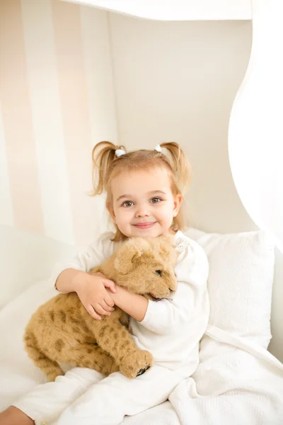 Girl playing with a toy — Stock Photo, Image