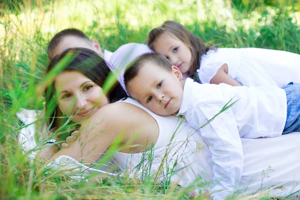 Cute family on nature — Stock Photo, Image
