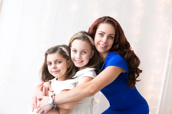 Beautiful mom with daughters — Stock Photo, Image