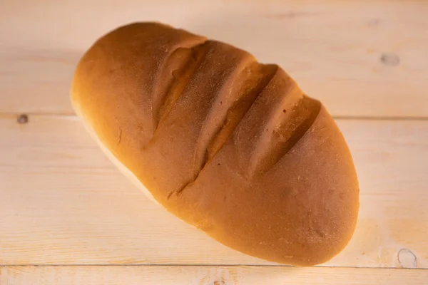 Laib Brot Auf Hellem Holzgrund Lebensmittel Nahaufnahme — Stockfoto