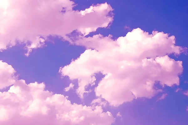 white air clouds against the purple sky. clear summer da
