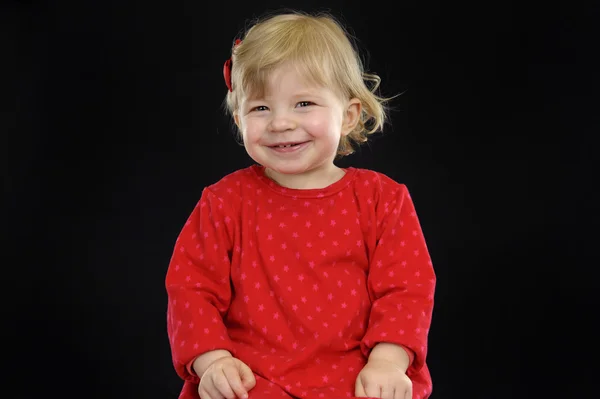 Porträtt av en skrattande litet barn — Stockfoto