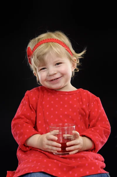 Niña bebiendo jugo , Imagen De Stock