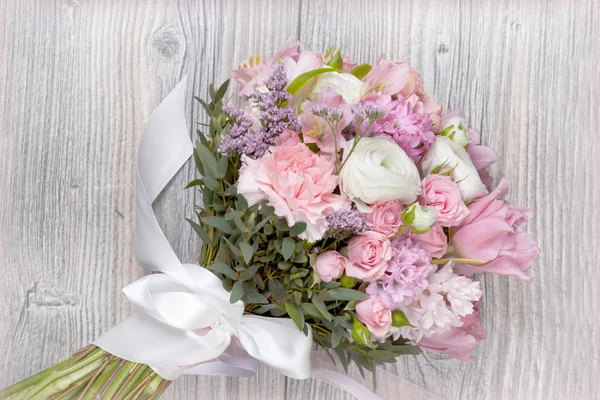 Valentine flowers on wooden background — Stock Photo, Image