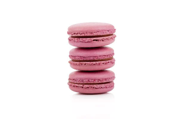 Three red colored macaroons isolated — Stock Photo, Image