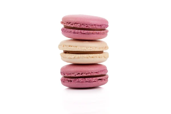 Three red and white stacked macaroons isolated — Stock Photo, Image