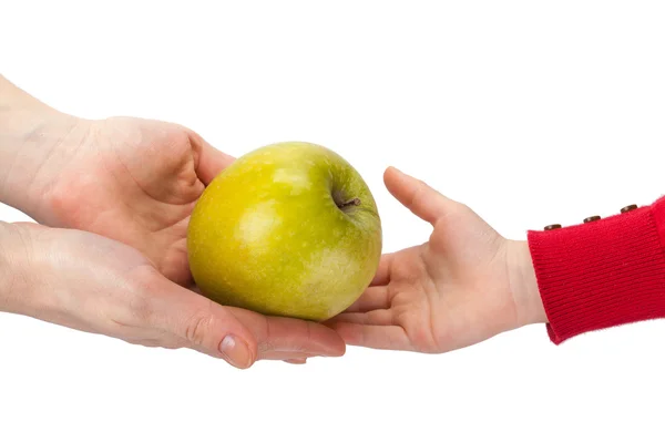 Mother passes an apple to her child isolated on white — Stock Photo, Image