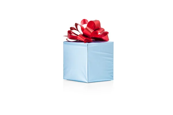 Blue gift box with red ribbon — Stock Photo, Image