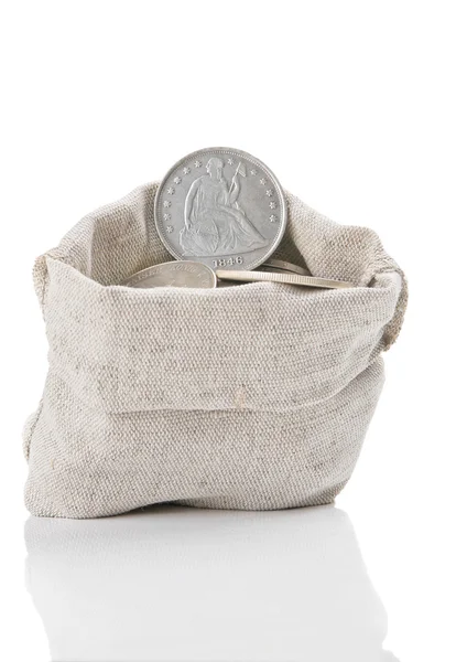 Old silver coins in bag — Stock Photo, Image