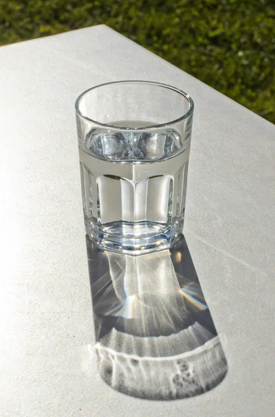 Glass vase with water — Stock Photo, Image