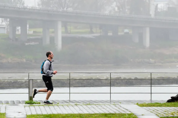 Desporto com chuva — Fotografia de Stock