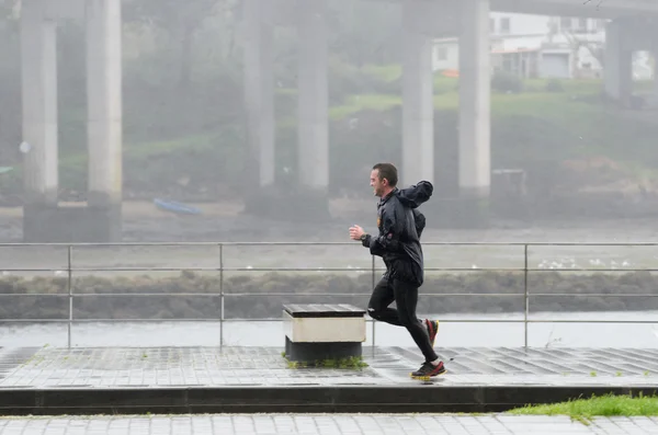 Deporte con lluvia Fotos de stock