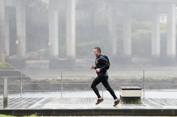 Deporte con lluvia Fotos de stock libres de derechos