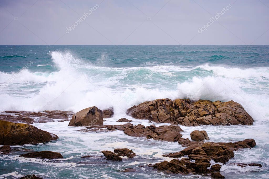View of the Galician coast on a day of strong winds, near the village of Baiona (Spain)