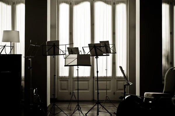 Music stands in black and white — Stock Photo, Image