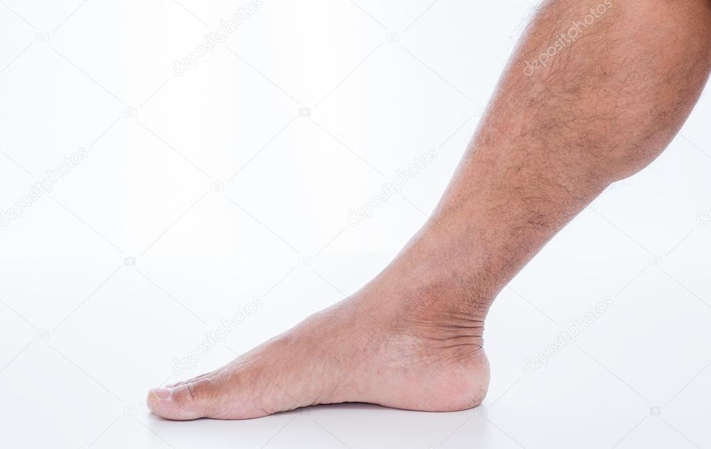 Man foot on white background