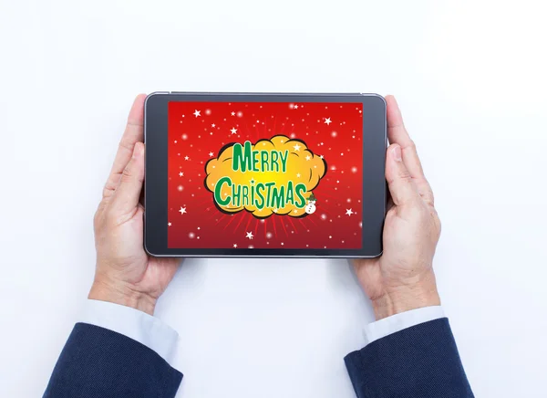 Zakenman handen met tablet pc met merry christmas o — Stockfoto