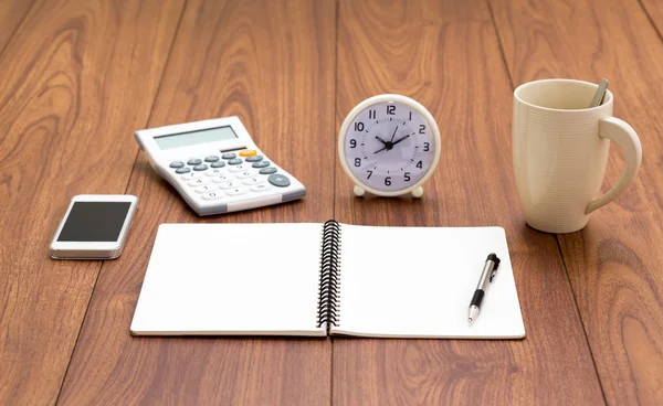 Notebook and office accessories on wood background — Stock Photo, Image