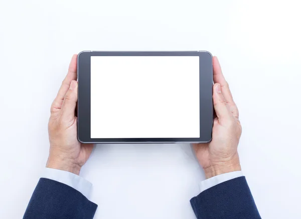 Руки бізнесмена тримають цифровий планшетний комп'ютер на білому фоні — стокове фото