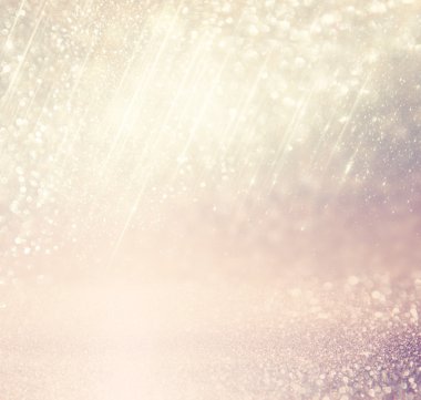 Glitter vintage ışıklar arka plan. Altın, gümüş, mavi ve beyaz. de-odaklı.