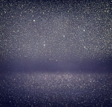 Glitter vintage ışıklar arka plan. Altın, gümüş, mavi ve siyah. de-odaklı.
