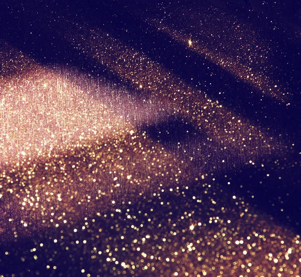 キラキラ ビンテージ ライト背景。金と黒。デフォーカス. — ストック写真