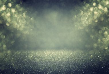 Glitter vintage ışıklar arka plan. Altın, yeşil ve siyah. defocused.