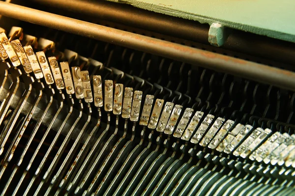 Close up image of metalic tapewriter keys. vintage filtered. selective focus — Stock Photo, Image