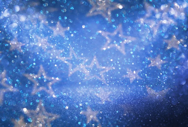 Glitter vintage lights background. blue, silver and black. defocused. — Stock Photo, Image