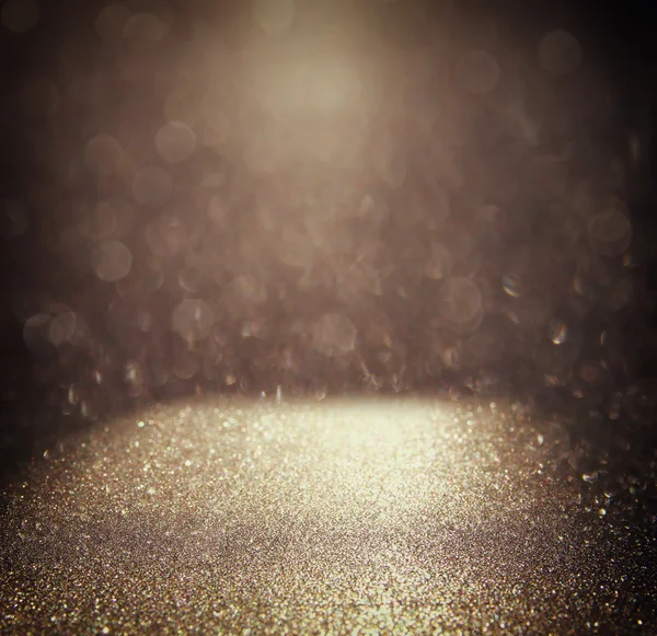 Glitter vintage ışıklar arka plan. altın rengi ve siyah. defocused. — Stok fotoğraf