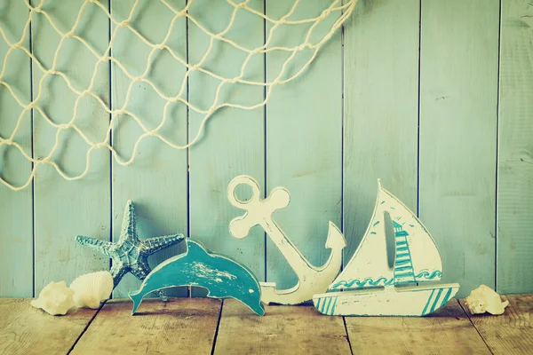 Nautical life style objects on wooden table. vintage filtered — Stock Photo, Image