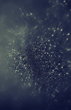 Glitter vintage ışıklar arka plan. Mavi, gümüş ve siyah. defocused.