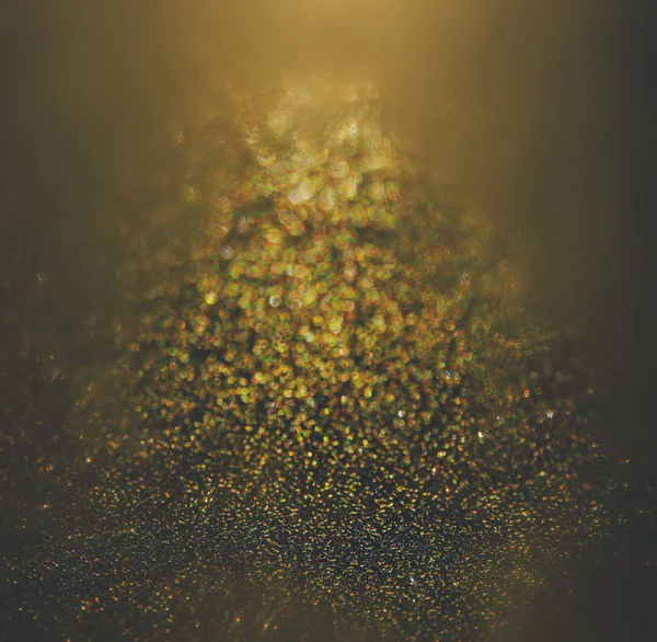 Glitter vintage lights background. gold and black. defocused — Stock Photo, Image