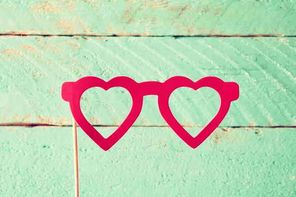 Paper heart shape fake glasses in sticks — Stock Photo, Image