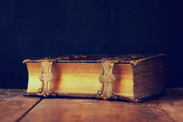 Low key image of antique story book. vintage filtered. — Stock Photo, Image
