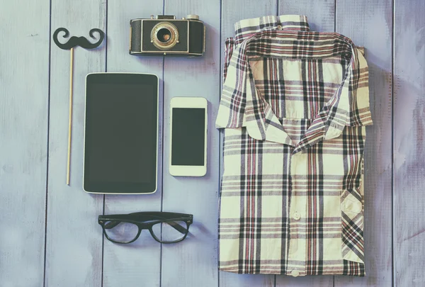 Foto van het bovenaanzicht van hipster accessoires en kleding — Stockfoto