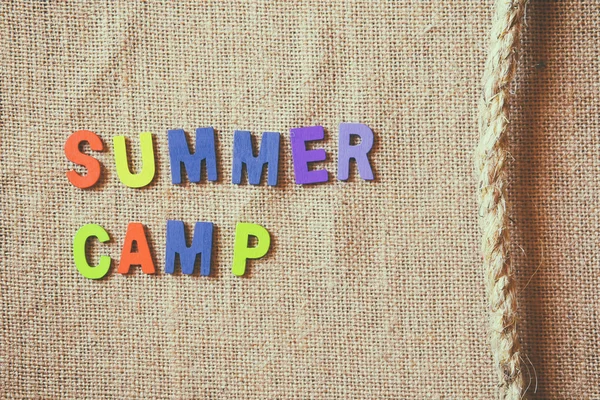 Colorful wooden letters with phrase: SUMMER CAMP — Stock Photo, Image