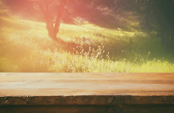 Wood boards and abstract forest background — Stock Photo, Image