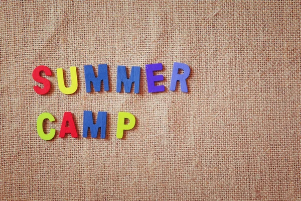 Colorful wooden letters with phrase: SUMMER CAMP — Stock Photo, Image