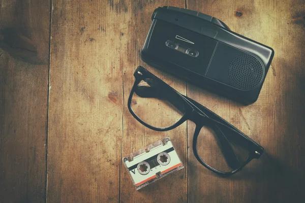 Investigation concept. tape recorder, cassete and glasses — Stock Photo, Image