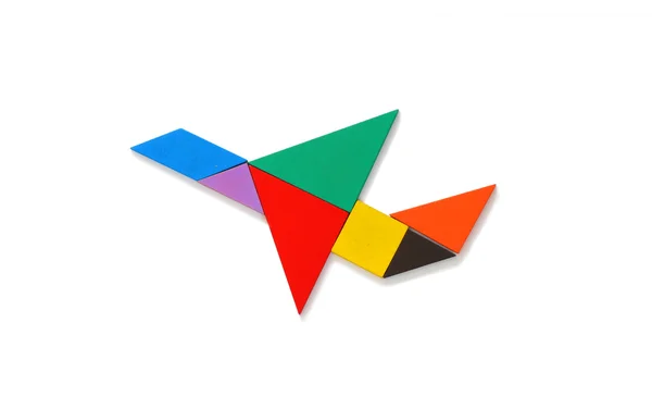 Samolot z tangram puzzle — Zdjęcie stockowe