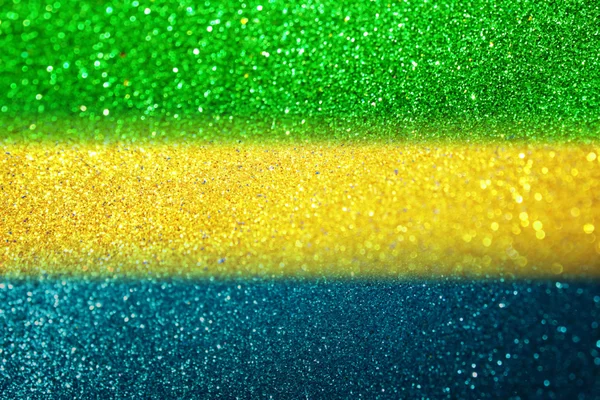 Flou abstrait paillettes lumières arrière-plan en utilisant le drapeau brésilien colo — Photo