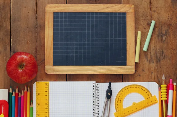 Back to school concept. Writing supplies on the table — Stock Photo, Image