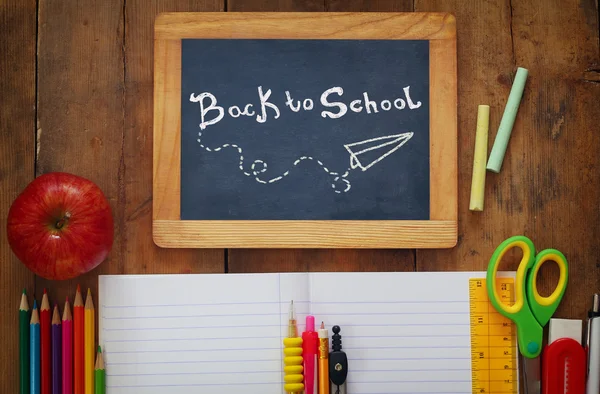 Back to school concept. Writing supplies on the table — Stock Photo, Image