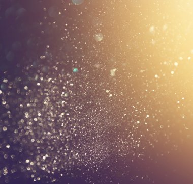 Metalik glitter vintage ışıklar arka plan. De-odaklı.
