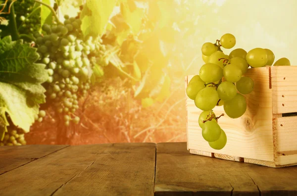 Summer grapes on wooden table — Stock Photo, Image