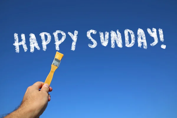 Ember viszont pimasz boldog szöveggel holading festék vasárnap — Stock Fotó