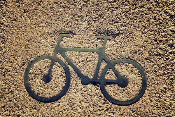 Black bycicle sign on lanes asphalt road. — Stock Photo, Image